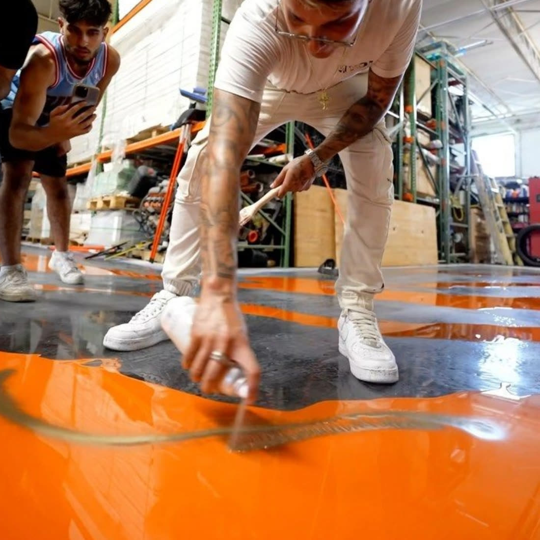 Don pouring resin on a live job