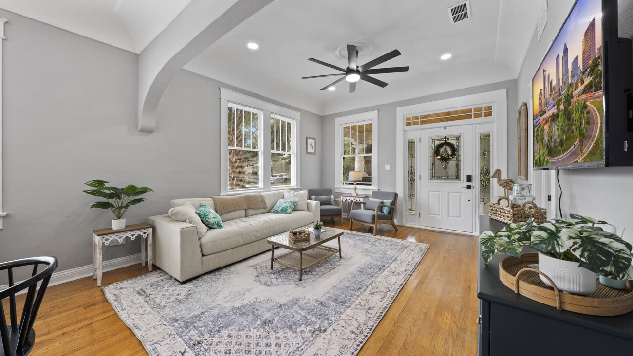 Bright staged living room in a Tampa home shot with HDR real estate photography