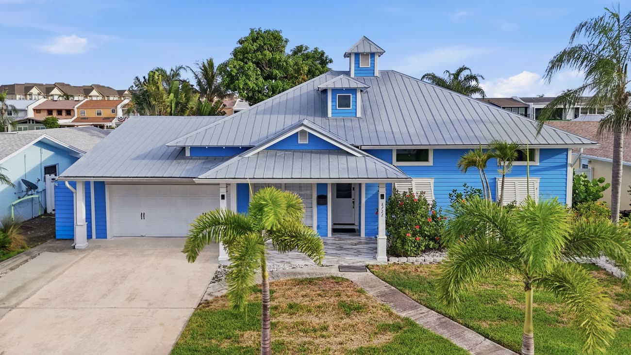 Aerial drone photograph of a Tampa Bay property and its street frontage