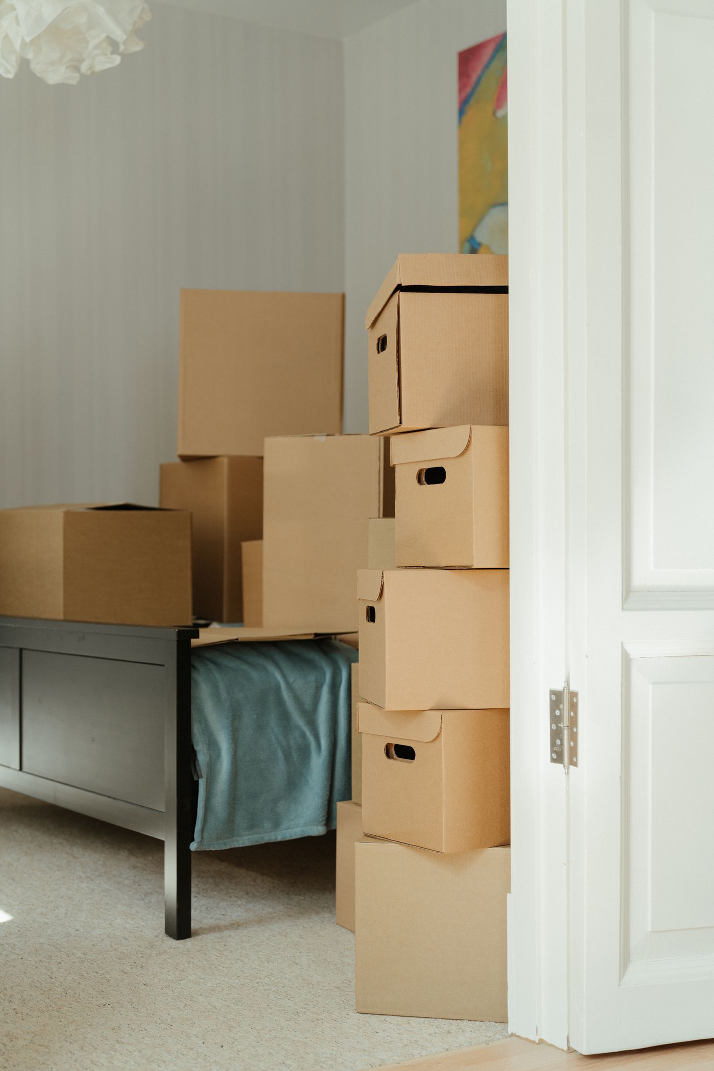 Room stacked with moving boxes ready for a cleanout